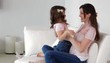 Caucasian girl running to mother