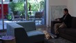 Japanese couple working and using cell phone at home with dog