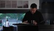 Video: Hispanic man at home approaching counter to make notes and telephone call Hispanic man at home approaching counter to make notes and telephone call