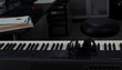 Pan across electronic keyboard in creative space