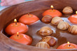 Photo: Beautiful candles in water close-up Beautiful candles in water close-up