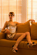 Woman and venetian blind