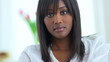 Serious African American woman looking at camera