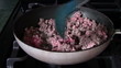 Left Handed Cook Stirring Ground Beef