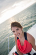 Foto: Woman sailing in a yacht Woman sailing in a yacht