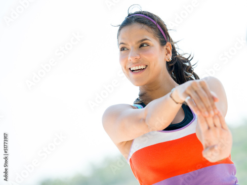 Photo: Woman doing stretching exercises Woman doing stretching exercises