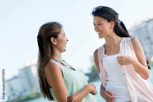 Photo: Happy friends talking Happy friends talking