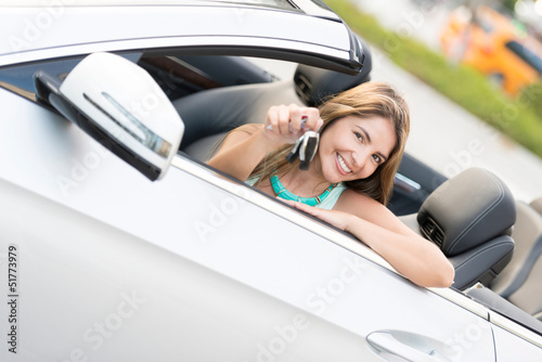 Photo: Woman holding car keys Woman holding car keys