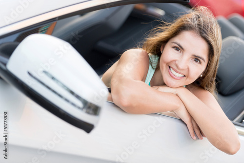 Photo: Woman in a convertible car Woman in a convertible car
