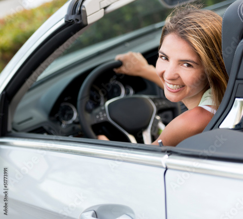 Photo: Woman renting a car Woman renting a car