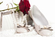 White shoes and bag with pearls beads and rose