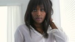 Serious African American woman looking at camera