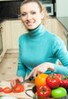 Cheerful young woman cooking