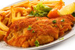 Pork chop, French fries and vegetables