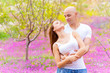 Young couple in spring garden