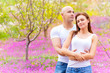 Photo: Loving couple on floral field Loving couple on floral field