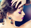 Purple makeup and manicure.