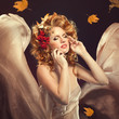 Autumn Woman Fashion Portrait. Fall. Beautiful Girl.