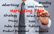 business man writing marketing plan concept