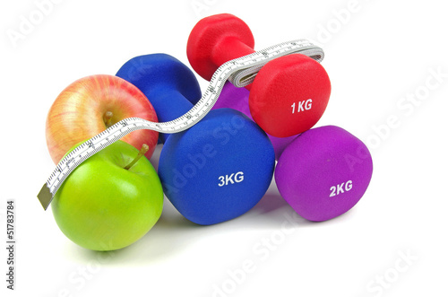 Photo: dumb bells and fruit dumb bells and fruit