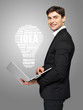 businessman with laptop and lamp