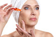 mature woman doing spa procedure