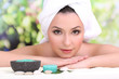 Beautiful young woman with towel