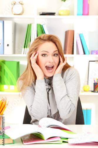 Photo: Portrait of teacher woman working in classroom Portrait of teacher woman working in classroom