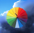 Regenschirm in Regenbogenfarben