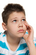 Photo: Looking up thoughtful boy Looking up thoughtful boy