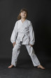 Preteen girl exercising karate