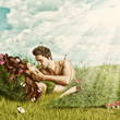 Loving sexy couple lying in bed of grass