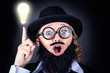 Mad professor with light bulb breakthrough