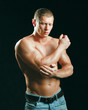 young man having pain in his elbow