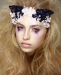 Brightly Painted Woman's Skin - Blue Eyeshadow. Meekness