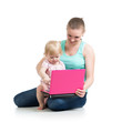mother and child working at laptop