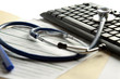A  stethoscope on a laptop computer