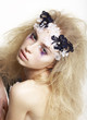 Girl with Bright Futuristic Mask and Make-up. Creative Faceart