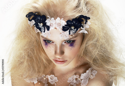 Photo: Overhead View of Unusual Artistic Trendy Blond Woman. Creativity Overhead View of Unusual Artistic Trendy Blond Woman. Creativity