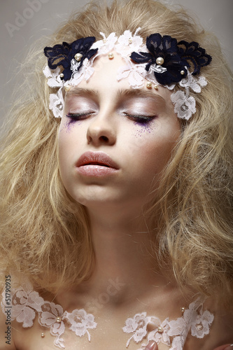 Photo: Imagination. Dreaming Teen Girl with Fantastic Makeup Imagination. Dreaming Teen Girl with Fantastic Makeup