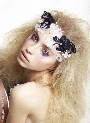 Photo: Girl with Bright Futuristic Mask and Make-up. Creative Faceart Girl with Bright Futuristic Mask and Make-up. Creative Faceart