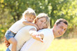 Foto: Young family on nature Young family on nature