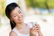 Woman texting on a smart phone
