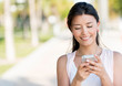 Woman sending a text message