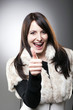Foto: Beautiful vivacious woman giving a thumbs up Beautiful vivacious woman giving a thumbs up