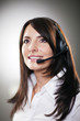 Beautiful call centre operator taking a call