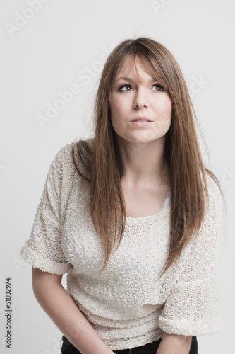 Photo: Beautiful thoughtful young woman Beautiful thoughtful young woman