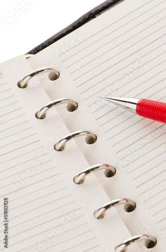 Photo: Note book and pencil Note book and pencil