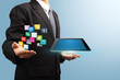 colorful application icon with tablet computer in the hands
