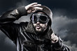Foto: pilot with glasses and vintage hat with funny expression pilot with glasses and vintage hat with funny expression
